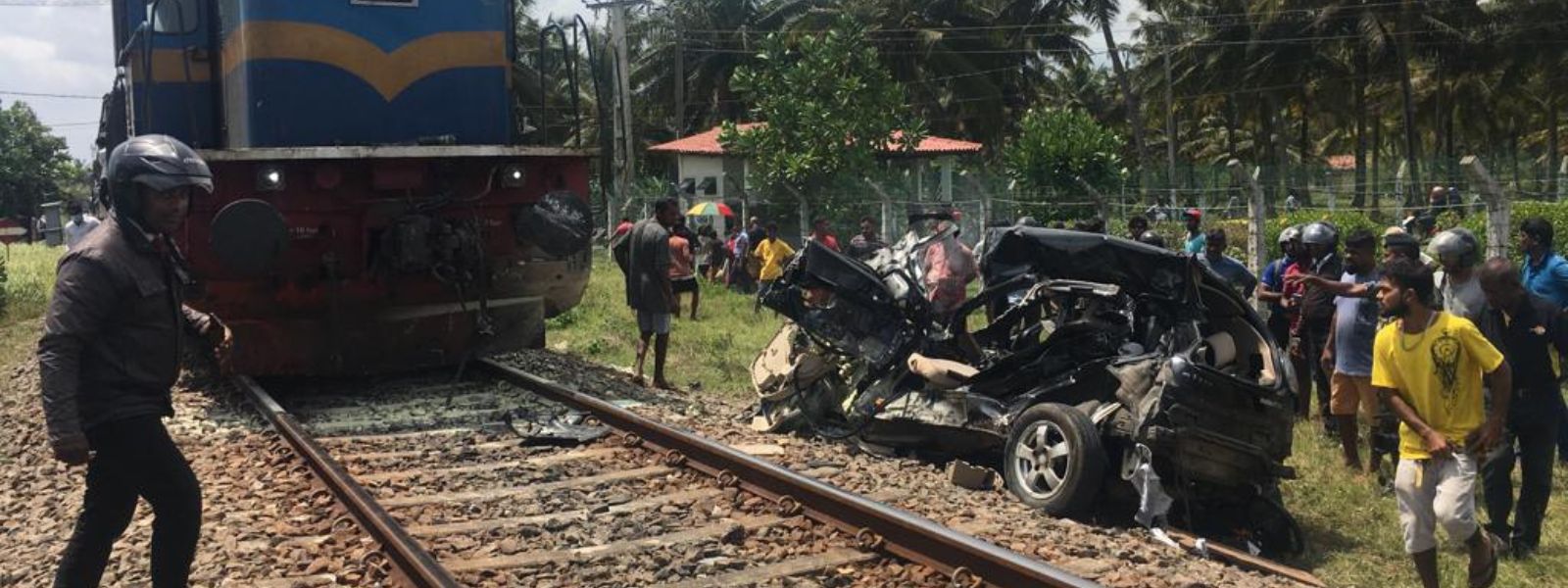 Two dead in tragic car-train collision in Galle